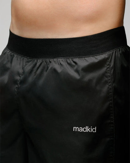 Detail 4 of OG 01 men’s shorts — close-up of Madkid logo and soft elastic waistband for comfort