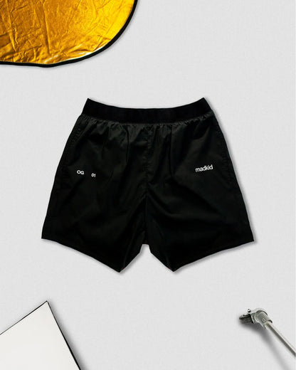 OG 01 men’s shorts front view — lightweight performance shorts by Madkid