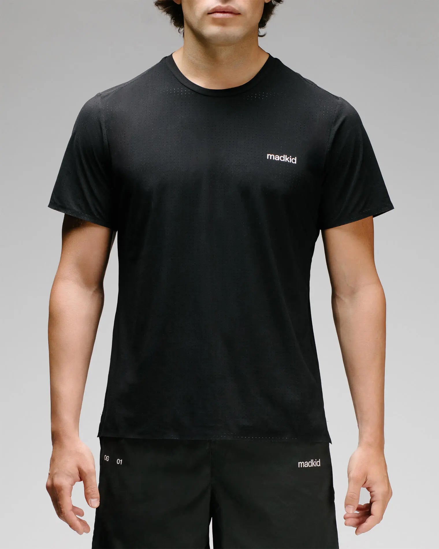 OG 01 men’s tee on model — performance t-shirt for training by Madkid