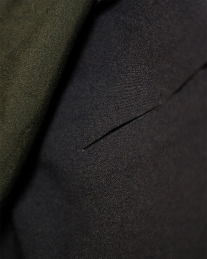 OG 01 women’s 2-in-1 shorts fabric detail — close-up of double-layer technical fabric and stitching texture by Madkid